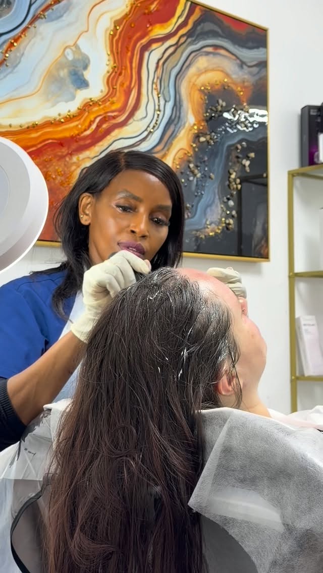 Liz delivering a treatment at The GlowHaus Aesthetics